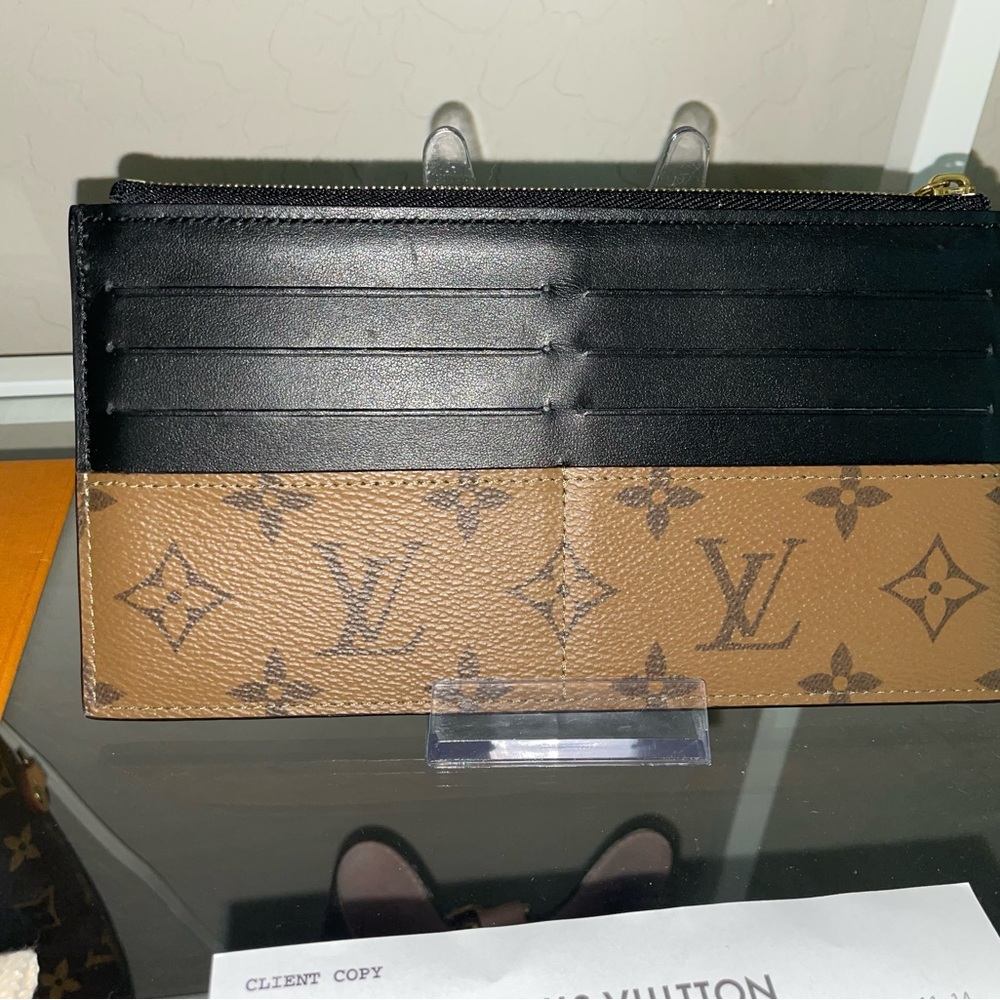 Authentic Louis Vuitton slim purse- reverse monogram